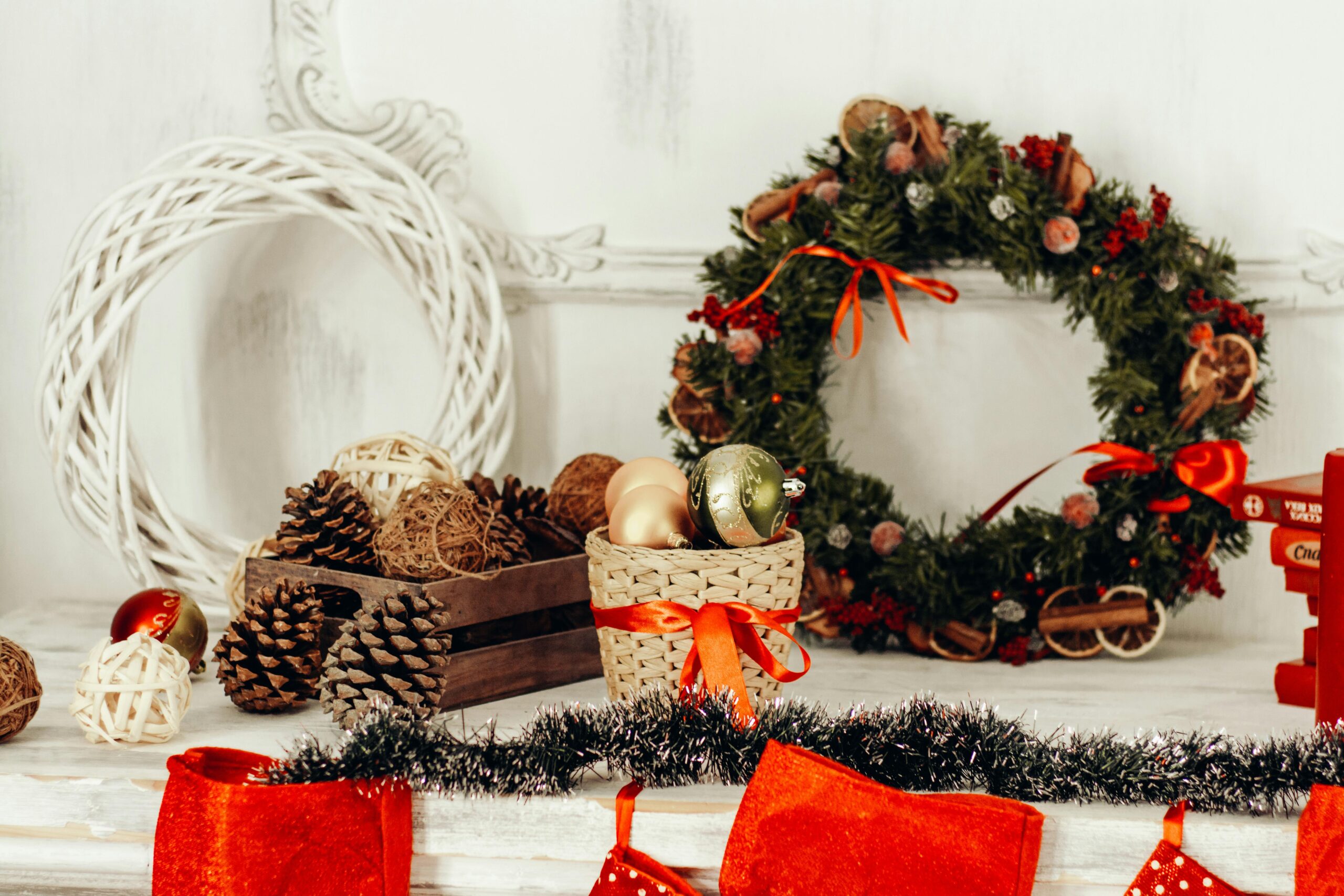 wreath and red decor on a table